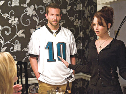 (Bradley Cooper and Jennifer Lawrence star in "Silver Linings Playbook.")