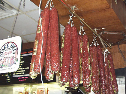 (The salami that used to hang over the counter at the Stage Deli in NYC are sadly gone.  File photo by Jay Lloyd)