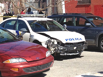 (A damaged Philadelphia police car allegedly stolen by a woman trying to elude police in Camden.  Credit: Paul Kurtz)