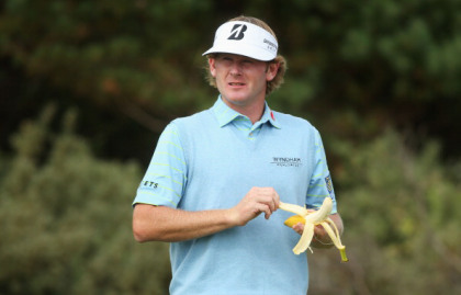 GULLANE, SCOTLAND - JULY 18:  Brandt Snedeker of the United States eats a banana on the 3rd hole during the first round of the 142nd Open Championship at Muirfield on July 18, 2013 in Gullane, Scotland.