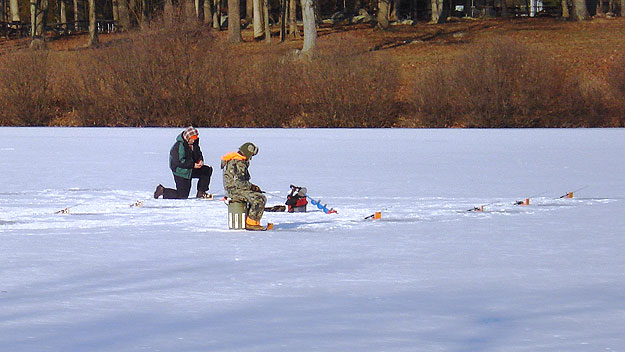 (Ice fishing at Green Lane Park, in upper Montgomery County, Pa.   Photo by Jay Lloyd)