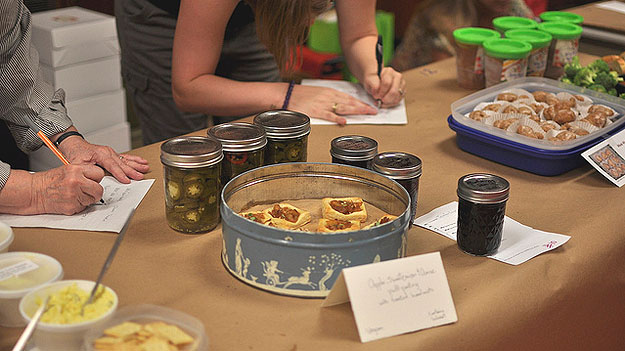 (Participants bid on food trades at the first Philly Food Swap, in 2011.  Photo provided by Marisa McClellan)