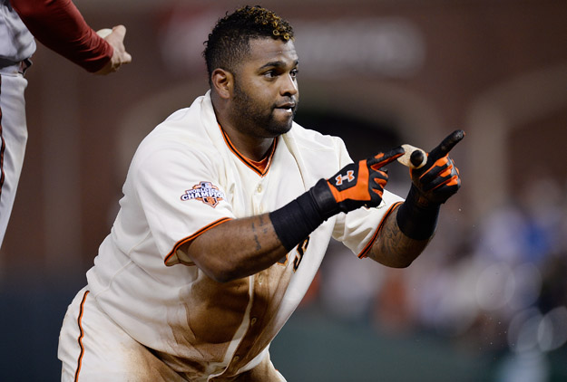 SAN FRANCISCO, CA - SEPTEMBER 05:  Pablo Sandoval #48 of the San Francisco Giants celebrates at third base after he hit an RBI triple scoring Hunter Pence #8 in the fourth inning against the Arizona Diamondbacks at AT&T Park on September 5, 2013 in San Francisco, California. 