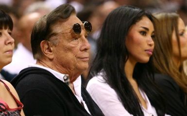 Donald Sterling and V. Stiviano (Photo by Ronald Martinez/Getty Images)