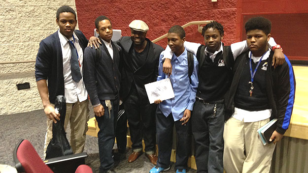 (Tariq "Black Thought" Trotter poses with kids from Audenreid Charter High School, 33rd and Tasker, where press conference announcing mural took place.  Photo by Cherri Gregg)