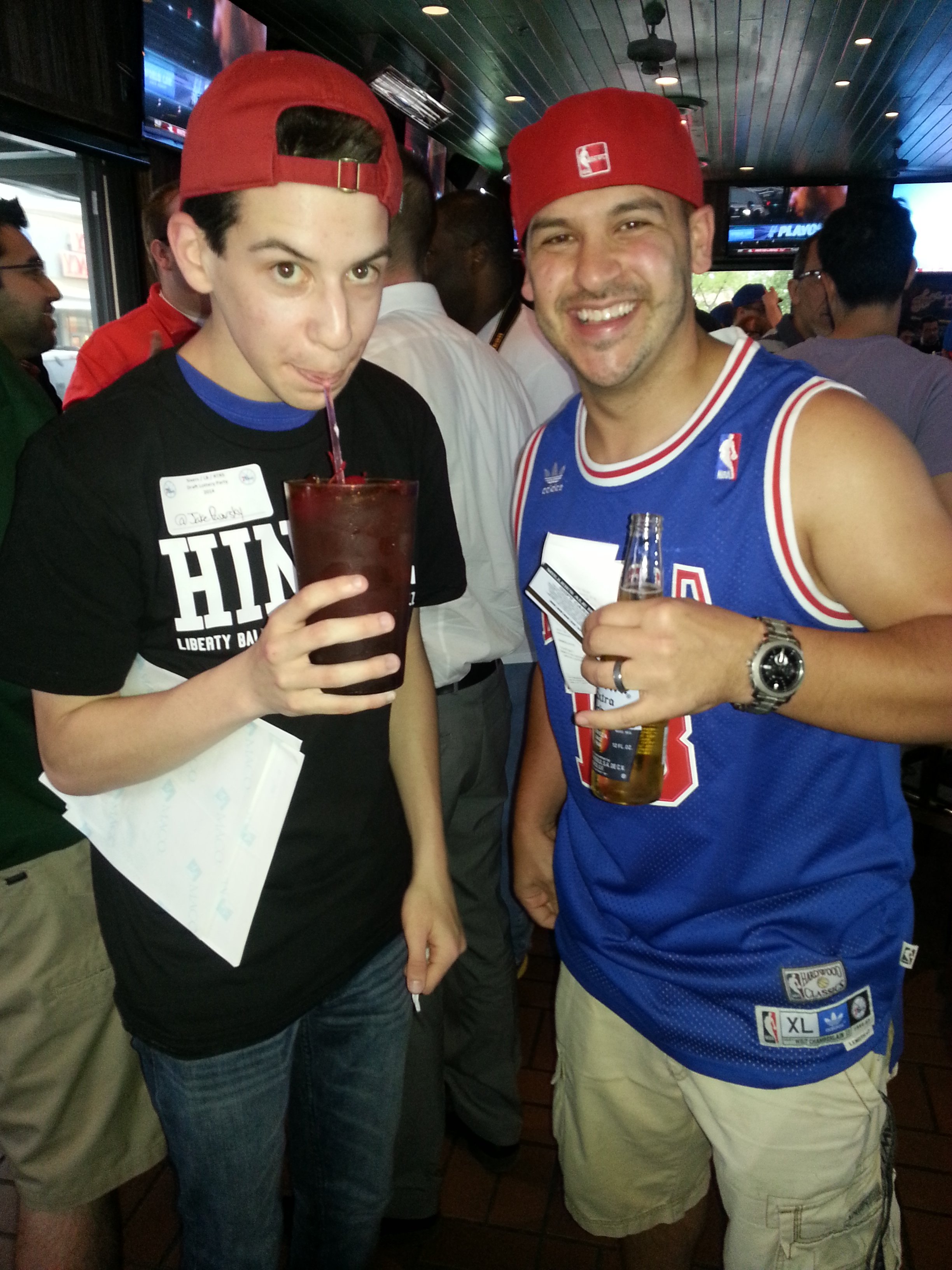 Liberty Ballers writer Jake Pavorsky (left) enjoys a Shirley Temple with Sixers die-hard Eric Negron