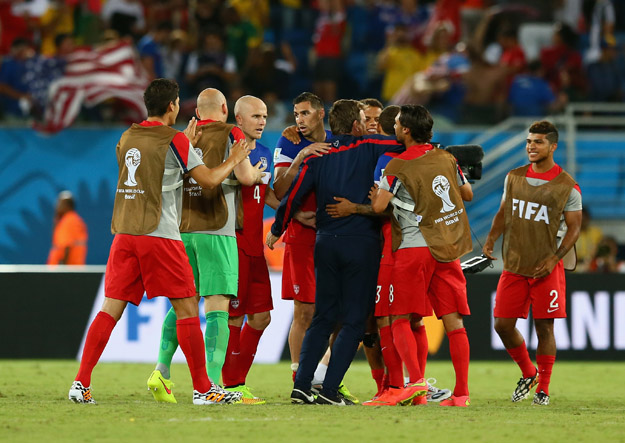 NATAL, BRAZIL - JUNE 16: United States players celebrate after defeating Ghana 2-1 during the 2014 FIFA World Cup Brazil Group G match between Ghana and the United States at Estadio das Dunas on June 16, 2014 in Natal, Brazil.  (Photo by Kevin C. Cox/Getty Images)