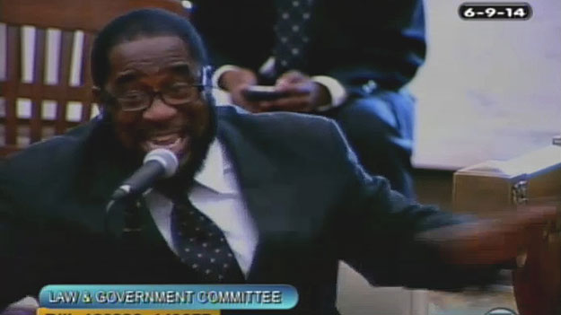 (Bishop Darrell Robinson testifies before City Council.  Image from City of Phila. TV)