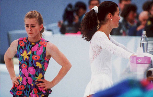 FILES, NORWAY - DECEMBER 15:  US figure skaters Tonya Harding (L) and Nancy Kerrigan avoid each other during a training session 17 February in Hamar, Norway, during the Winter Olympics. Kerrigan was hit on the knee in January 1994 during the US Olympic Trials and it was later learned that Harding's ex-husband and bodyguard masterminded the attack in hopes of improving Harding's chances at the US Trials and the Olympics. 
