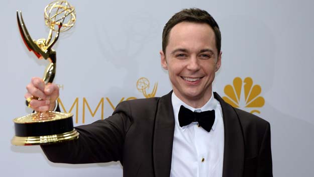Jim Parsons poses in the press room after winning the Outstanding Lead Actor in a Comedy Series Award for The Big Bang Theory (Episode: "The Relationship Diremption") during the 66th Emmy Awards (Photo credit MARK RALSTON/AFP/Getty Images)