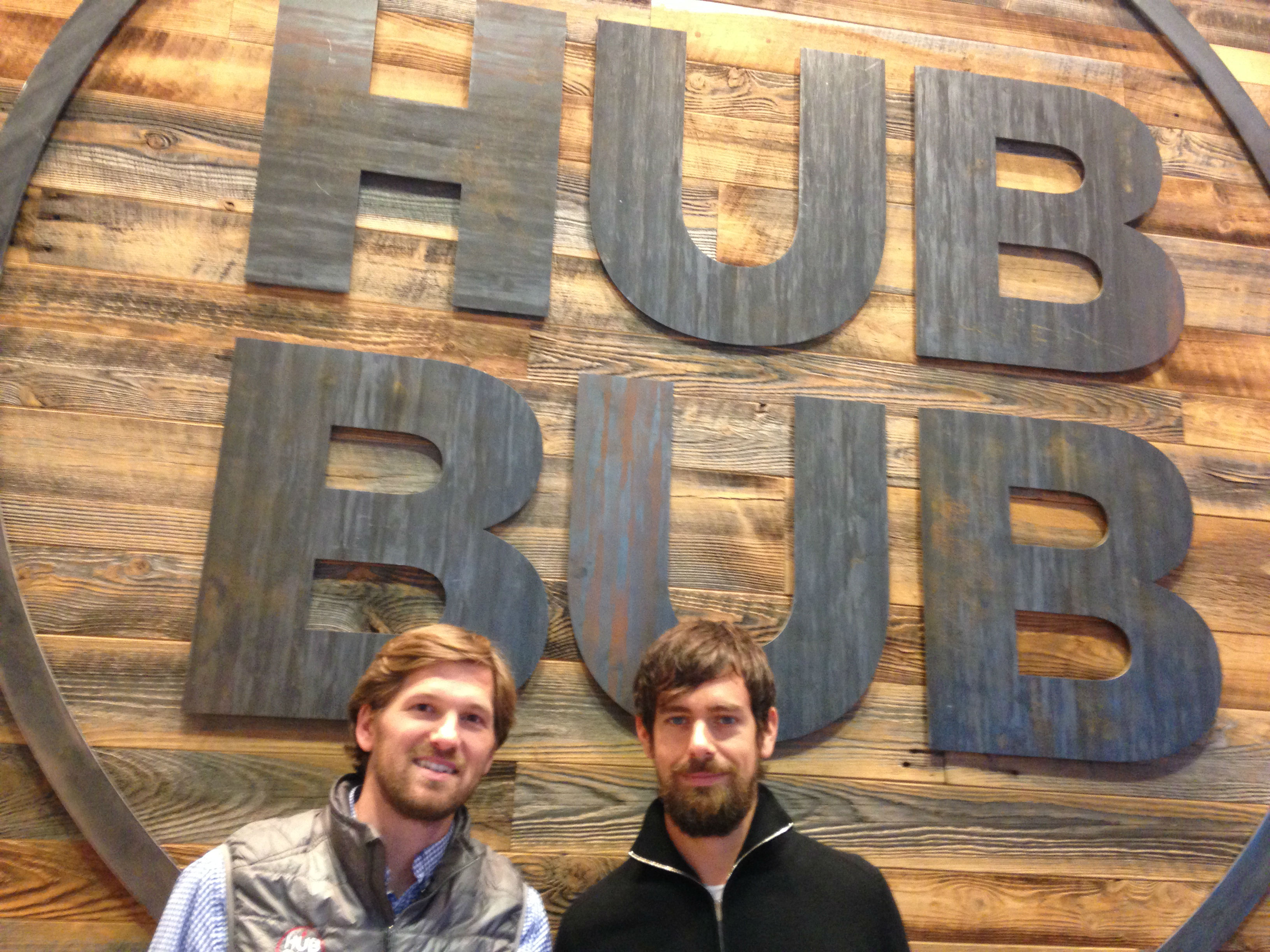 HubBub Coffee owner Drew Crockett on left, Twitter founder and Square CEO Jack Dorsey on right at HubBub Coffee's 17th and Arch location. (Credit: Ian Bush/KYW)