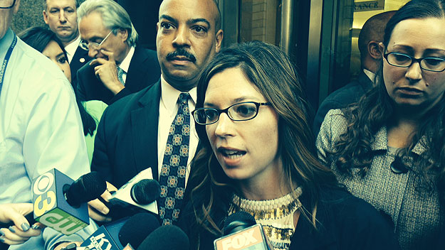 (Prosecutor Erin O'Brien speaks with reporters after obtaining convictions on all counts against Christina Regusters.  DA Seth Williams is in background.  Photo by Steve Tawa)