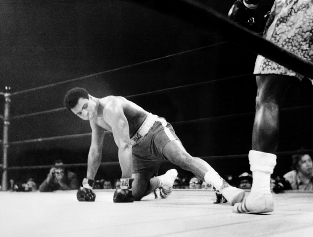 Madison Square Garden of the heavyweight boxing world championship fight between Muhammad Ali (Cassius Clay) (on the floor) and Joe Fazier.
