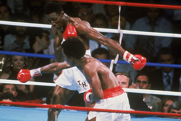 Sugar Ray Leonard throws a right punch at Thomas Hearns during the World Welterweight Championships.
