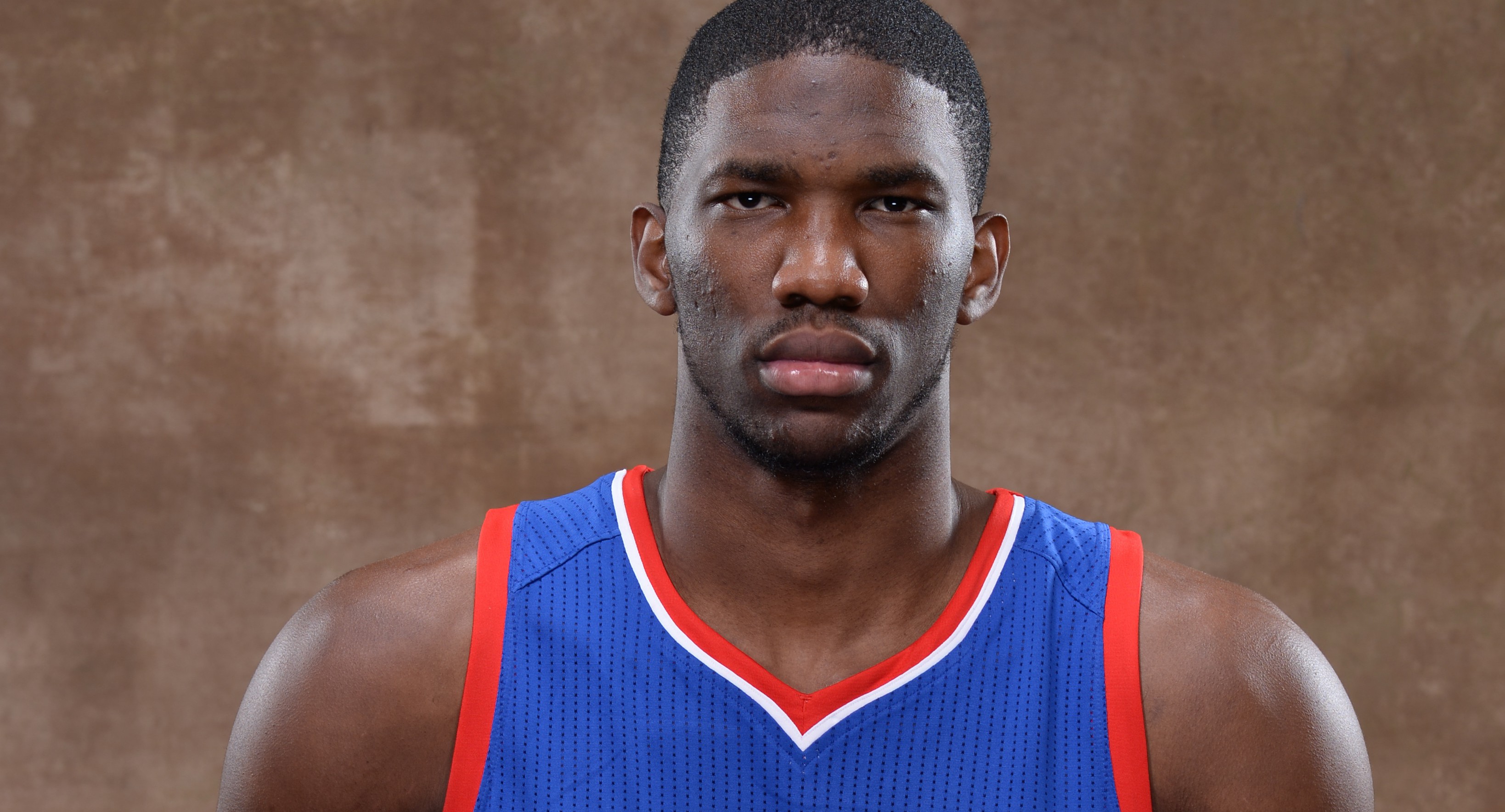 TARRYTOWN, NY - AUGUST 3:  Joel Embiid #11 of the Philadelphia 76ers poses for a portrait during the 2014 NBA rookie photo shoot on August 3, 2014 at the Madison Square Garden Training Facility in Tarrytown, New York. NOTE TO USER: User expressly acknowledges and agrees that, by downloading and or using this photograph, User is consenting to the terms and conditions of the Getty Images License Agreement. Mandatory Copyright Notice: Copyright 2014 NBAE (Photo by Jennifer Pottheiser /NBAE via Getty Images)