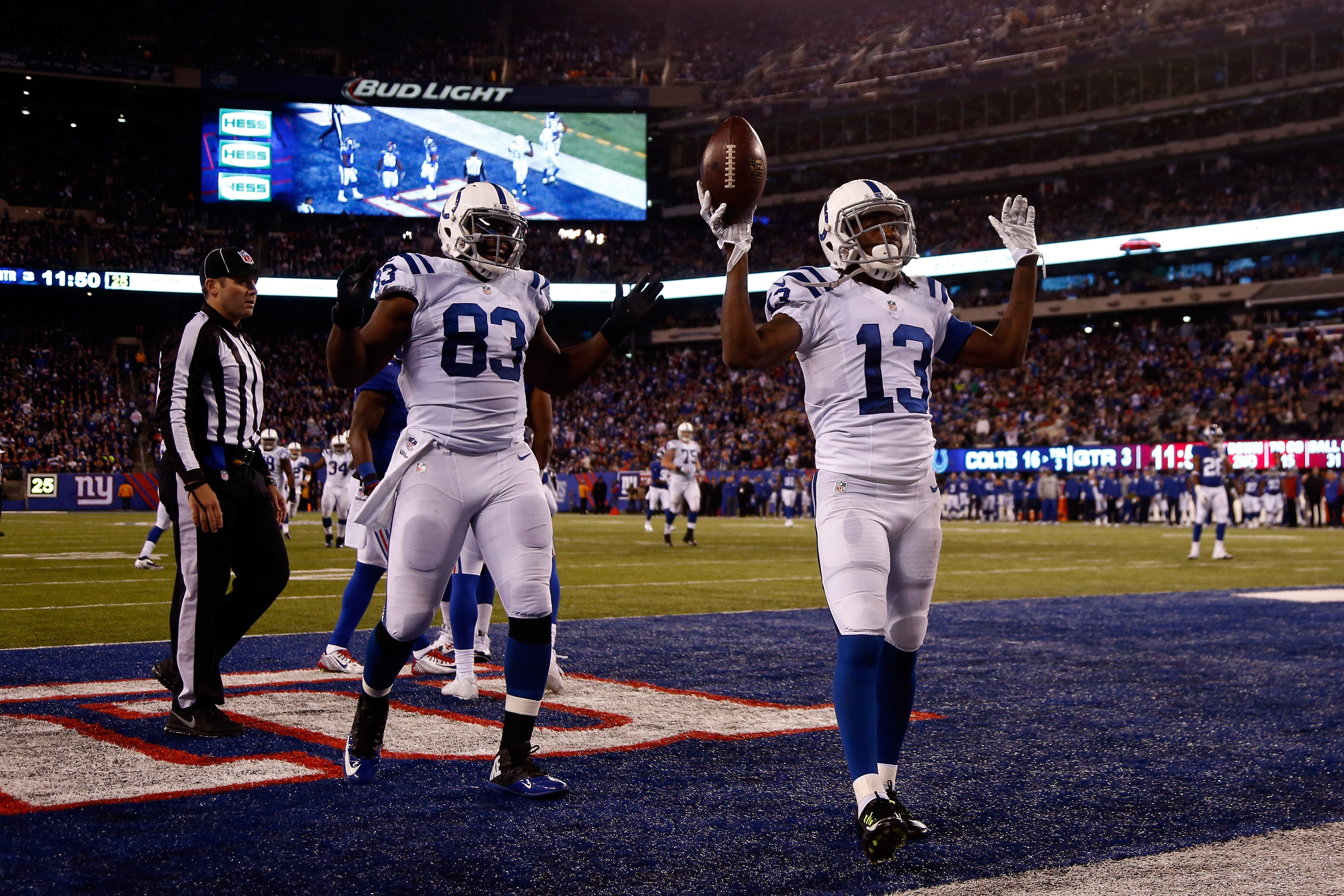 EAST RUTHERFORD, NJ - NOVEMBER 03: T.Y. Hilton #13 of the Indianapolis Colts celebrates with Dwayne Allen #83 after catching 30 yard touchdown pass thrown by Andrew Luck #12 in the third quarter against the New York Giants during their game at MetLife Stadium on November 3, 2014 in East Rutherford, New Jersey. (Photo by Jeff Zelevansky/Getty Images)