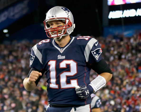FOXBORO, MA - NOVEMBER 02:  Tom Brady #12 of the New England Patriots reacts during the second quarter against the Denver Broncos at Gillette Stadium on November 2, 2014 in Foxboro, Massachusetts.  (Photo by Jim Rogash/Getty Images)