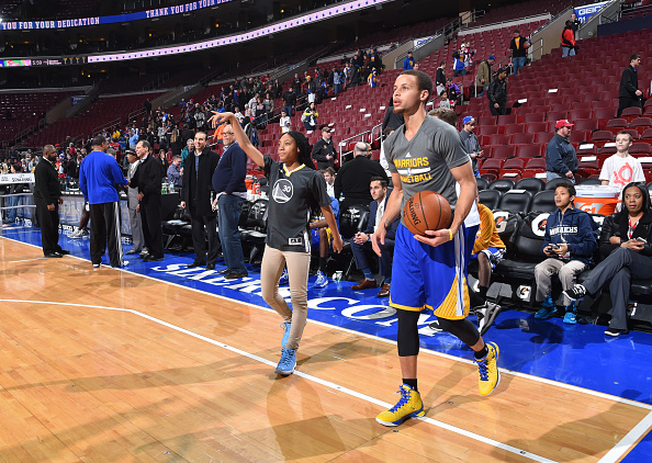 PHILADELPHIA, PA - FEBRUARY 9: Stephen Curry #30 of the Golden State Warriors shoots around with Mo'ne Davis Little League star prior to the game against the Philadelphia 76ers at Wells Fargo Center on February 9, 2015 in Philadelphia, Pennsylvania(Photo by Jesse D. Garrabrant/NBAE via Getty Images)