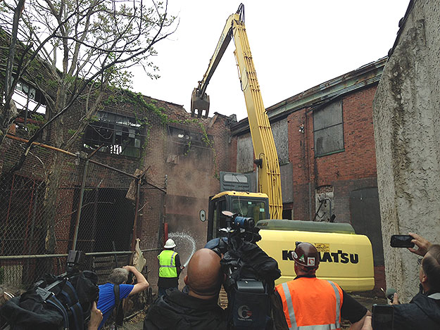 (Following the press conferece, an unsafe building is demolished in North Philadelphia.  Photo by Cherri Gregg)
