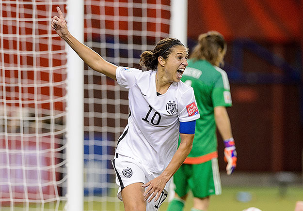 (Carli Lloyd celebrates after assisting on the goal by Kelley O'Hara in the FIFA Women's World Cup 2015 semi-final match on June 30th, in Montreal.  Photo by Minas Panagiotakis/ Getty Images) 