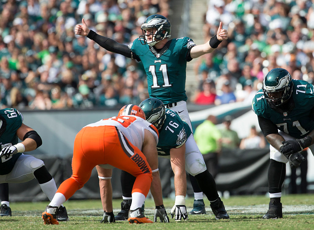 PHILADELPHIA, PA - SEPTEMBER 11: Carson Wentz #11 of the Philadelphia Eagles calls a play at the line of scrimmage in the third quarter against the Cleveland Browns at Lincoln Financial Field on September 11, 2016 in Philadelphia, Pennsylvania. The Eagles defeated the Browns 29-10. (Photo by Mitchell Leff/Getty Images)