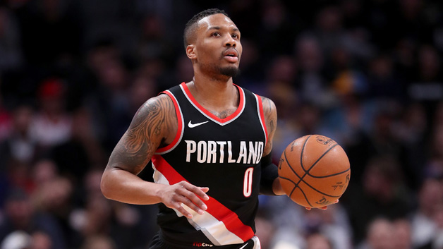 Damian Lillard #0 of the Portland Trail Blazers brings the ball down the court against the Denver Nuggets at the Pepsi Center on January 22, 2018 in Denver, Colorado.
