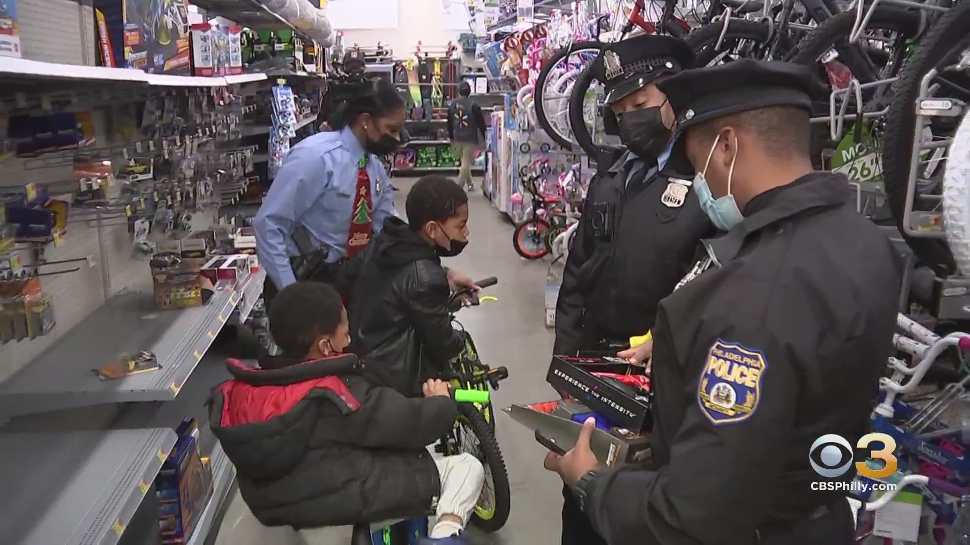 Philadelphia Police Department Holds Shop With A Cop Event To Bring Gifts To Children, Families