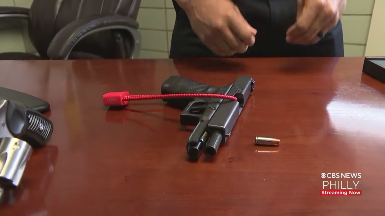 Philadelphia Police Captain Demonstrates How To Use Gun Lock As Preventable Firearm Deaths Rise